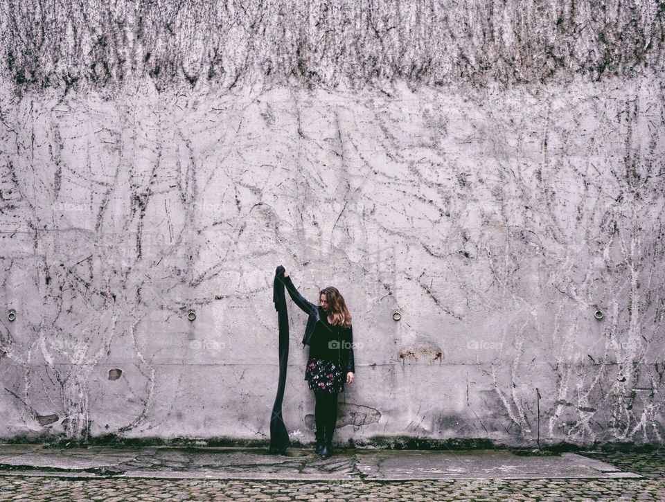 Magic wall . Lyonnais wall and a girl with a scarf 