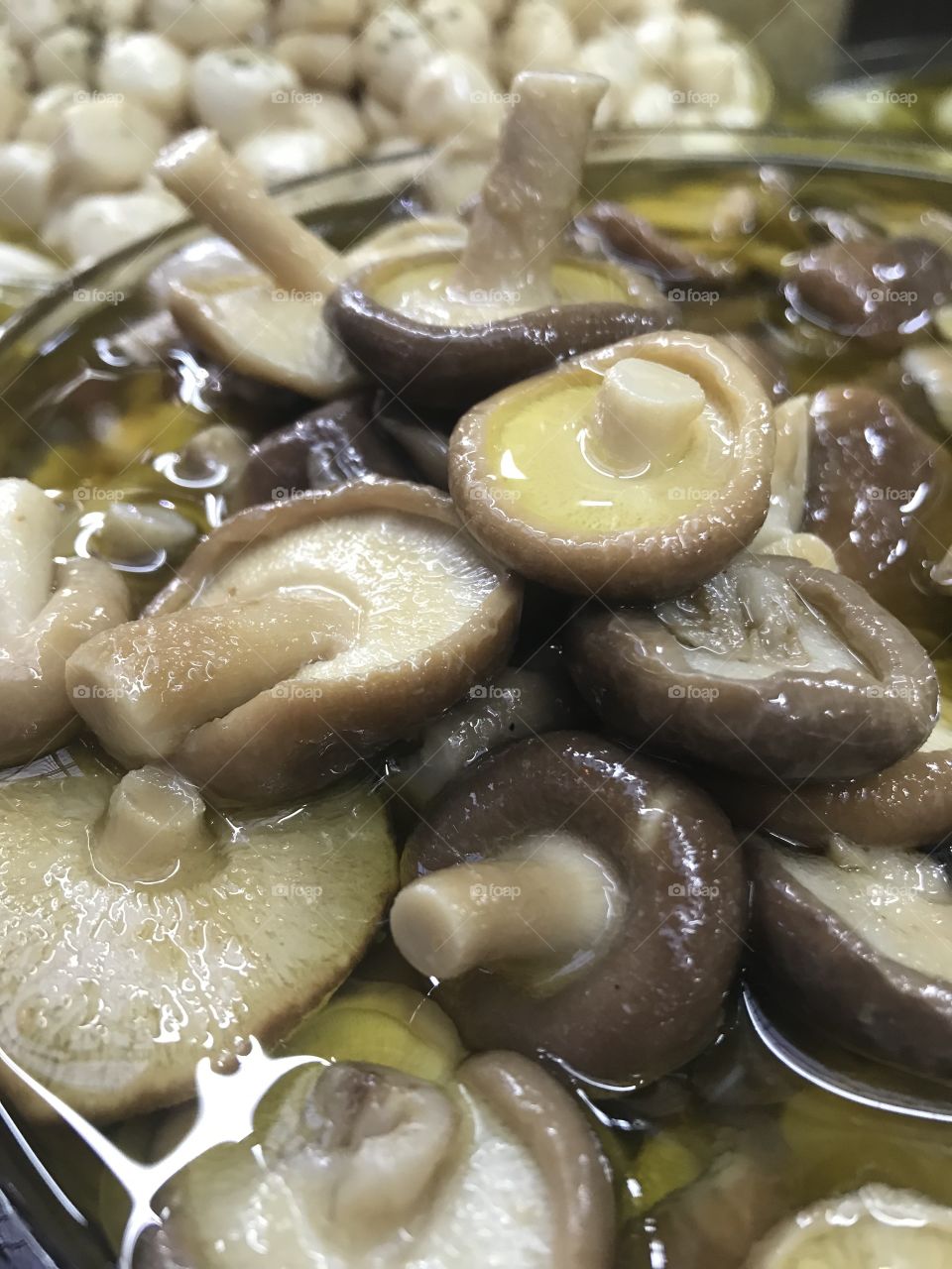 Cogumelos em azeite de oliveiras 