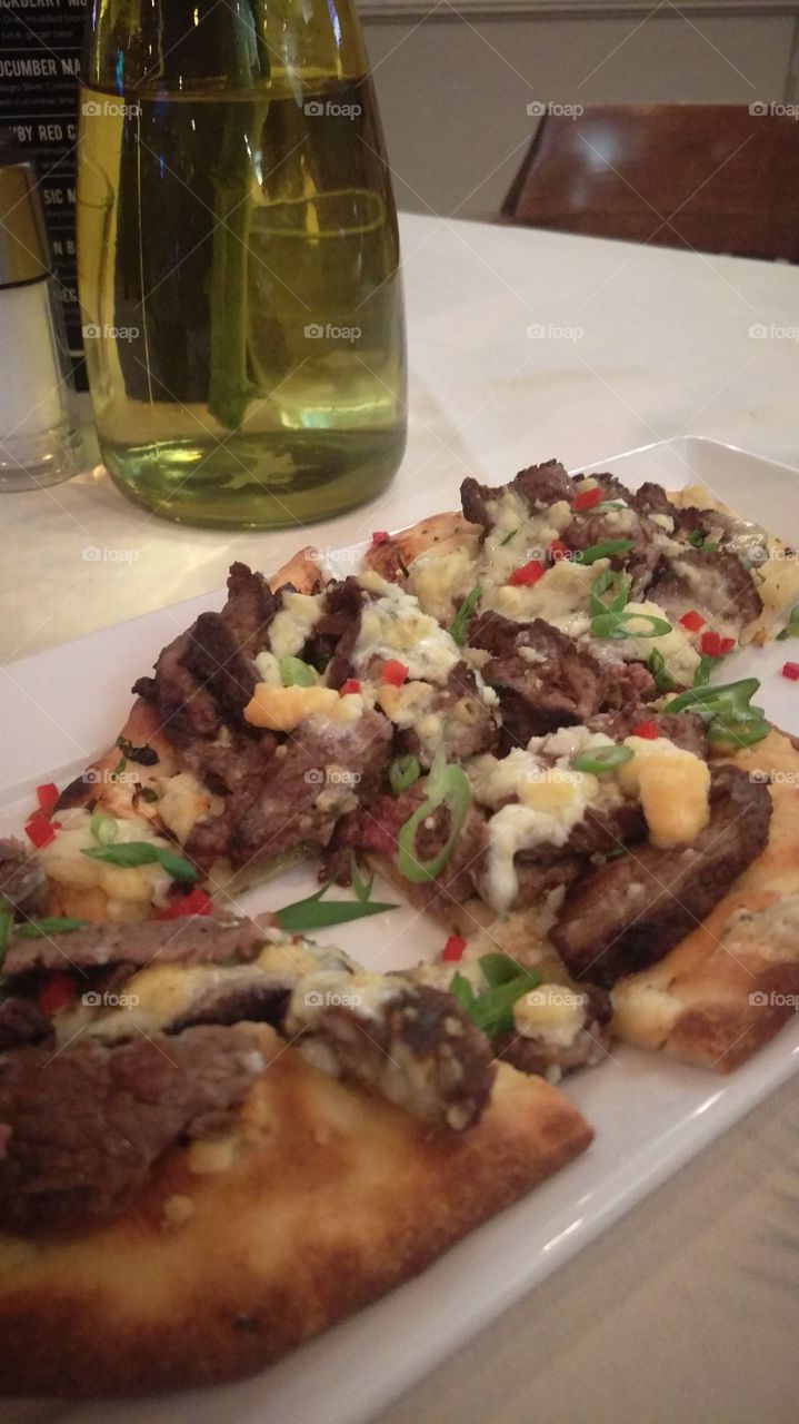 Black and blue pizza