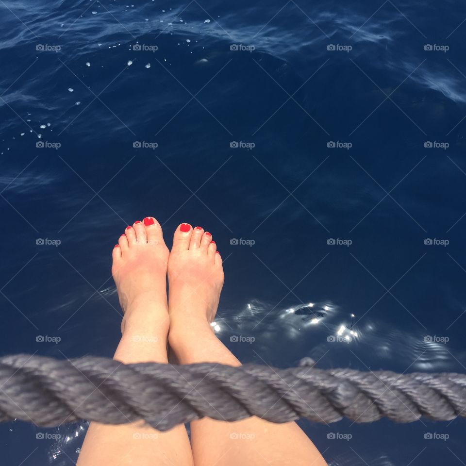 Bare feet on a boat 