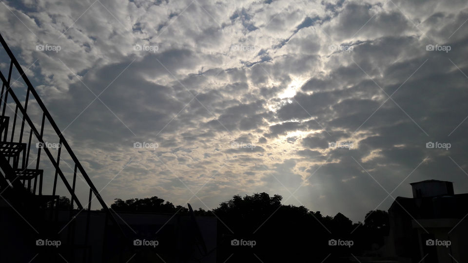 Clouds playing with the sun, creating beautiful scenes.