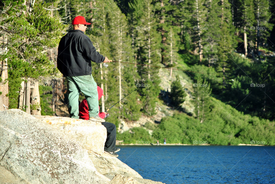 father and son fiahing in Lake