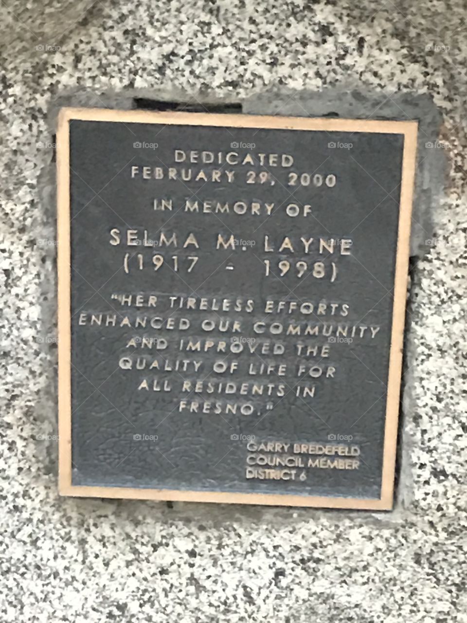 A memorial dedication at the neighborhood park.