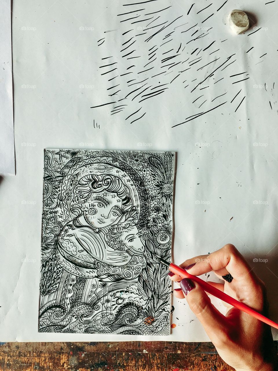 Hand drawing an icon. 