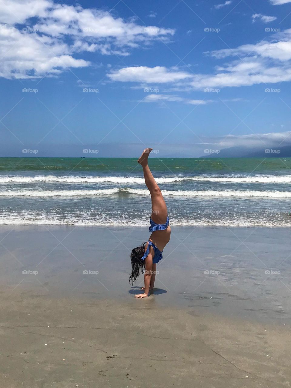 Child playing on the beach