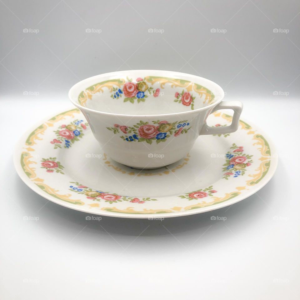 Antique porcelain cup and plate