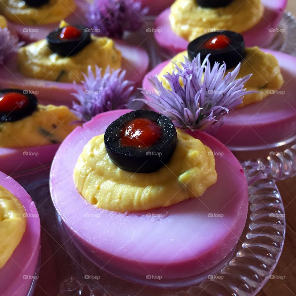 Deviled Eggs all dressed up for an appetizer party. Dyed naturally with pickled beet juice. 