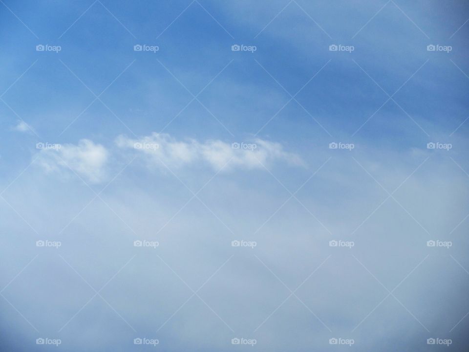 line of cloud in haze