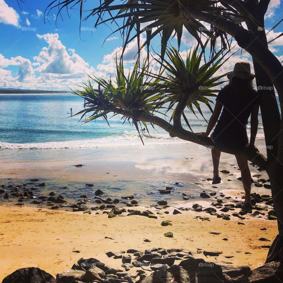 Summer days at the tropical beach with blue crystal sea and warm yellow sand in Australia 