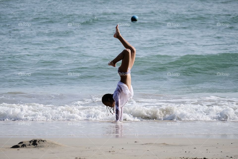 Tourist take summer time to play yoka on the beautiful beach in Thailand