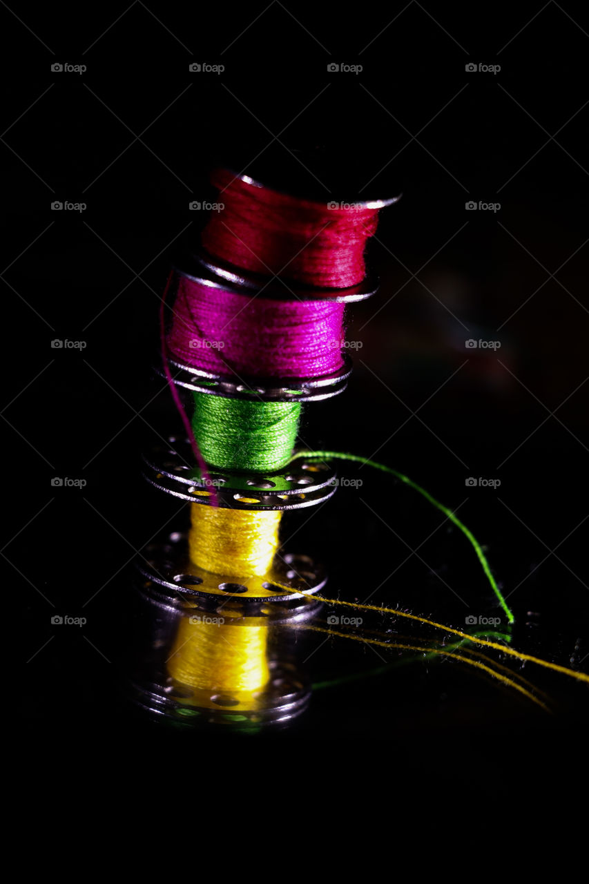 Red, pink, yellow,green threads