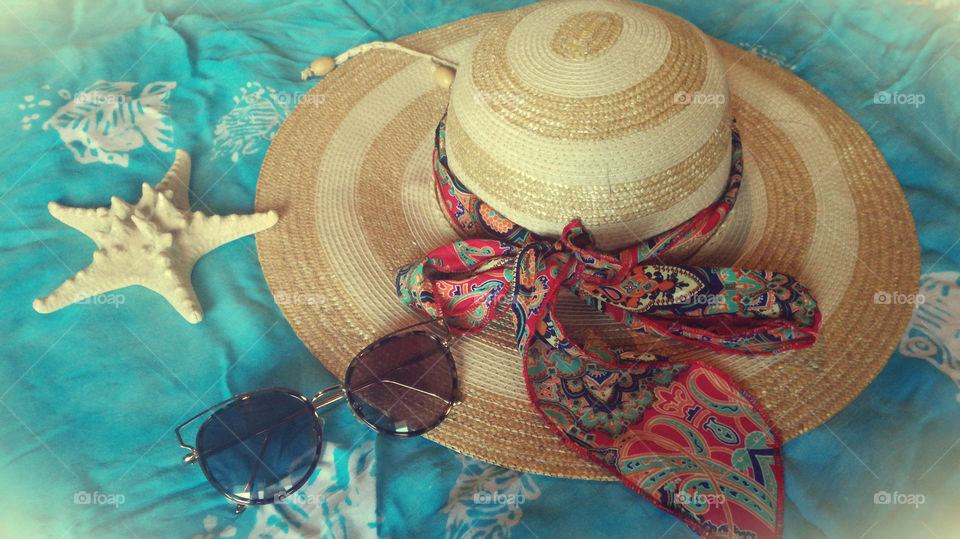 girly staff for beach. hat shell and sunglasses