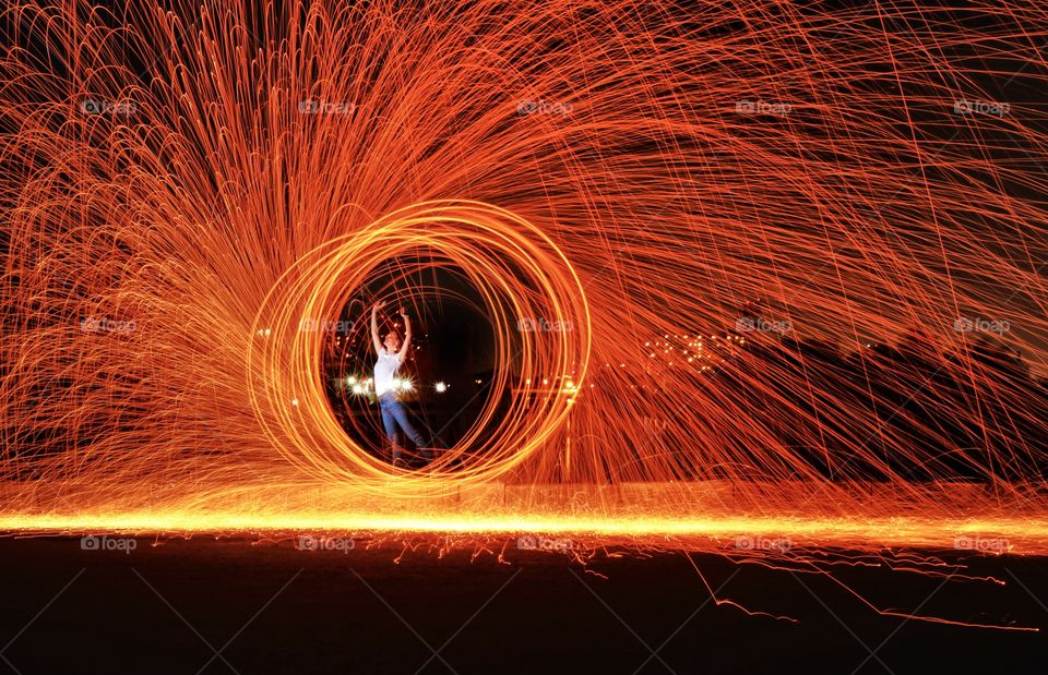 long exposure circle of burning sparks