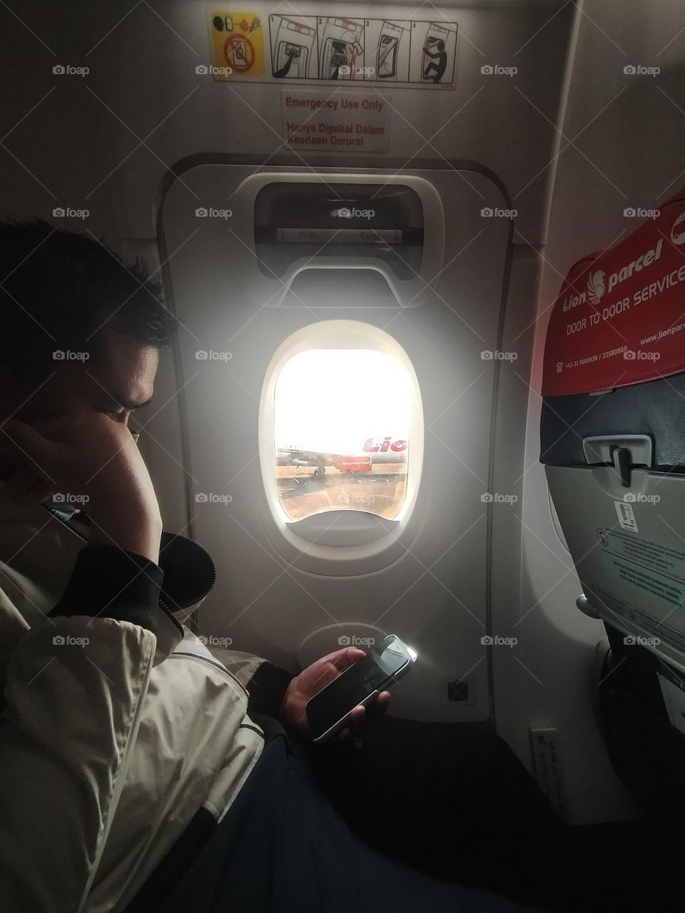 Thinking behind the airplane window