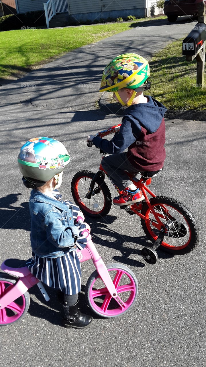 boy and girl on bike