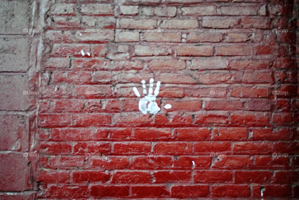 A hand on a wall in Dumbo Brooklyn