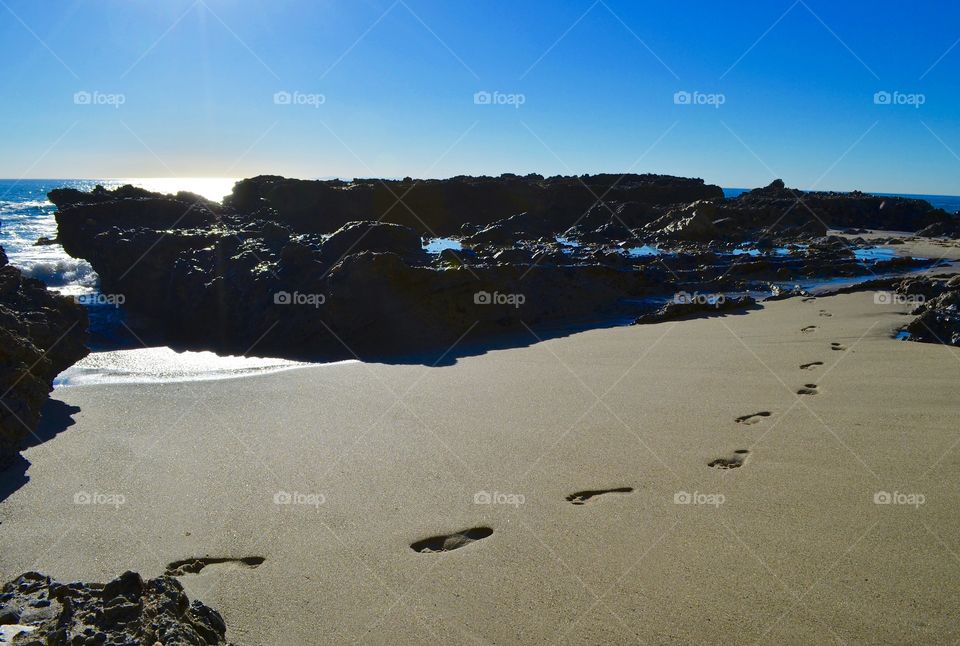 Footprints in the Sand. Adventure seekers always find hidden beauty. 