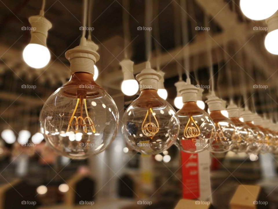 Vintage light bulbs in a row, Hanging round bulbs
