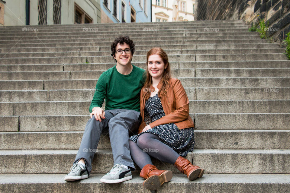 Couple sitting on steps 