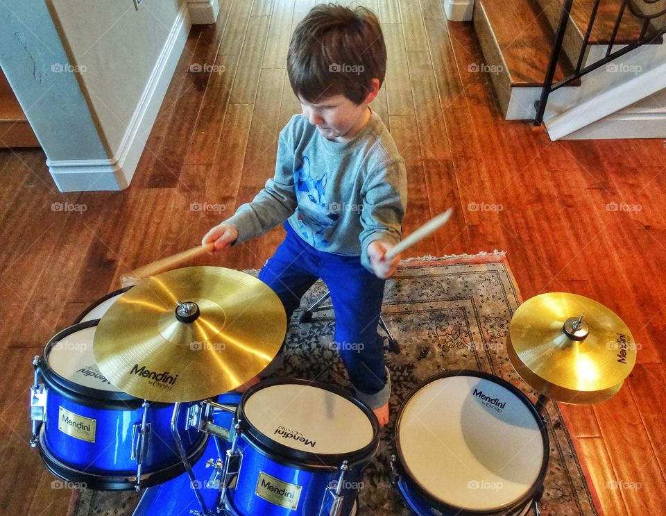 Little Boy Playing Drums