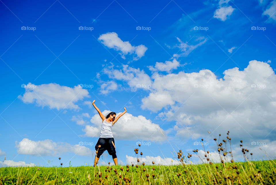 Woman enjoying in field