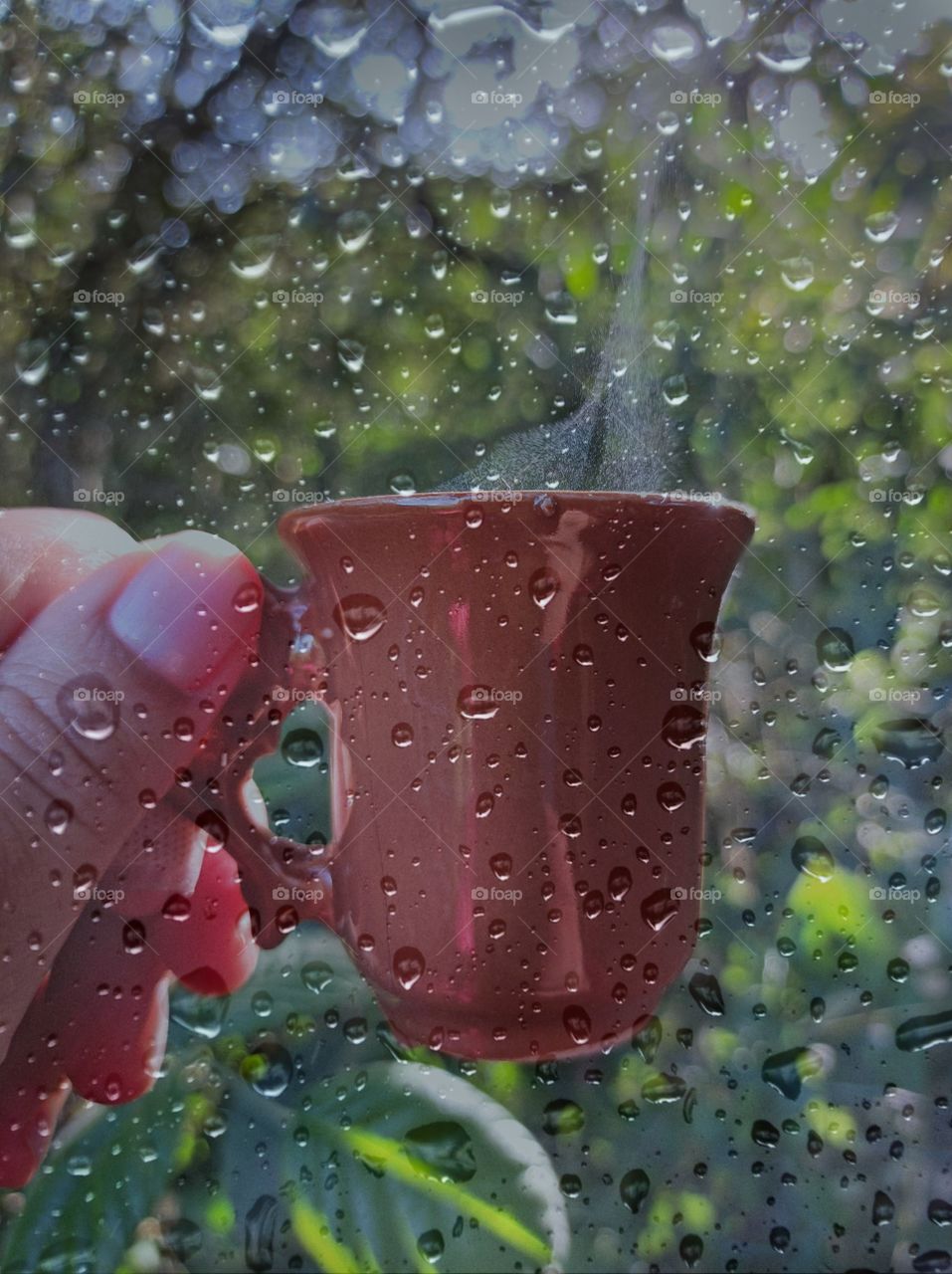 Coffee mug on rainy day