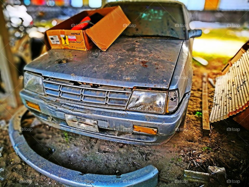 Close-up of abandoned car