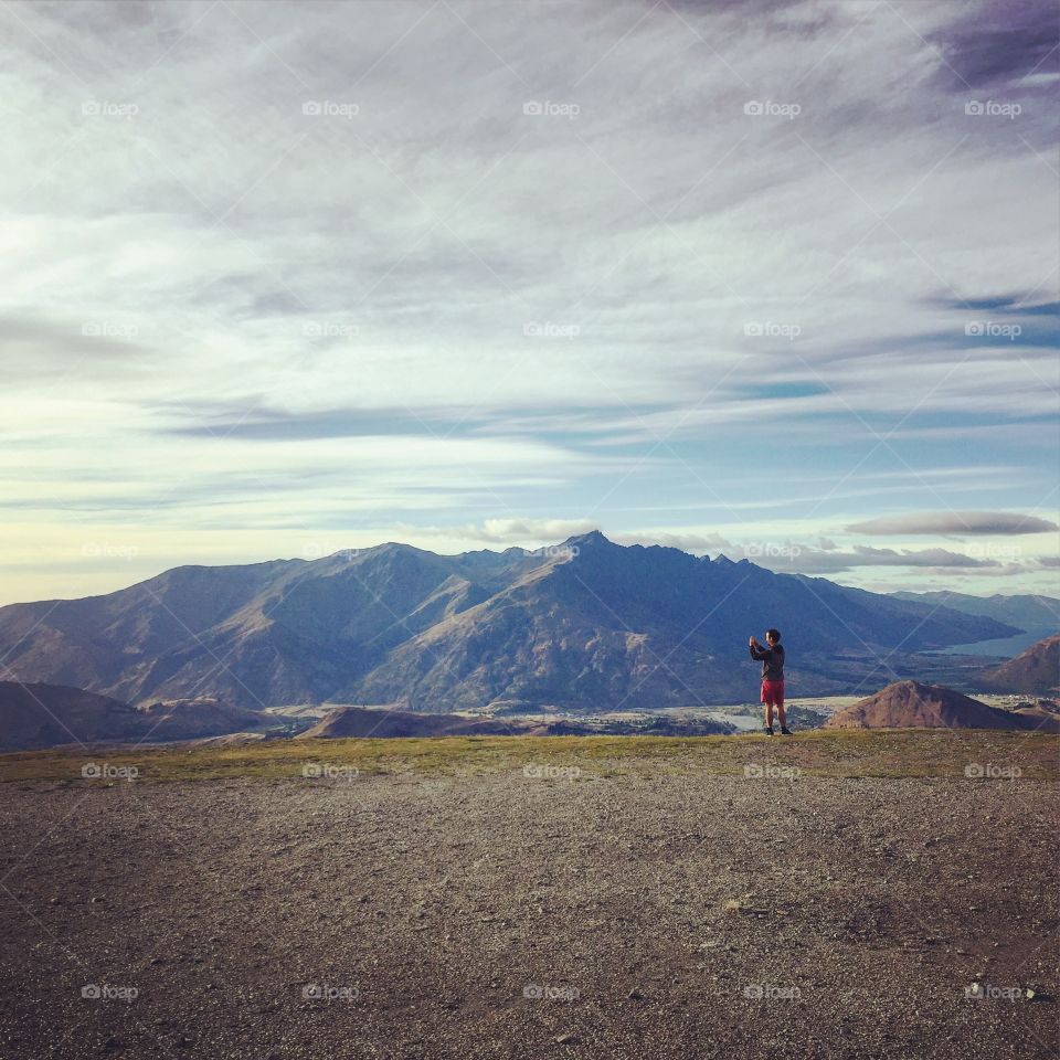 Man on top of mountain 