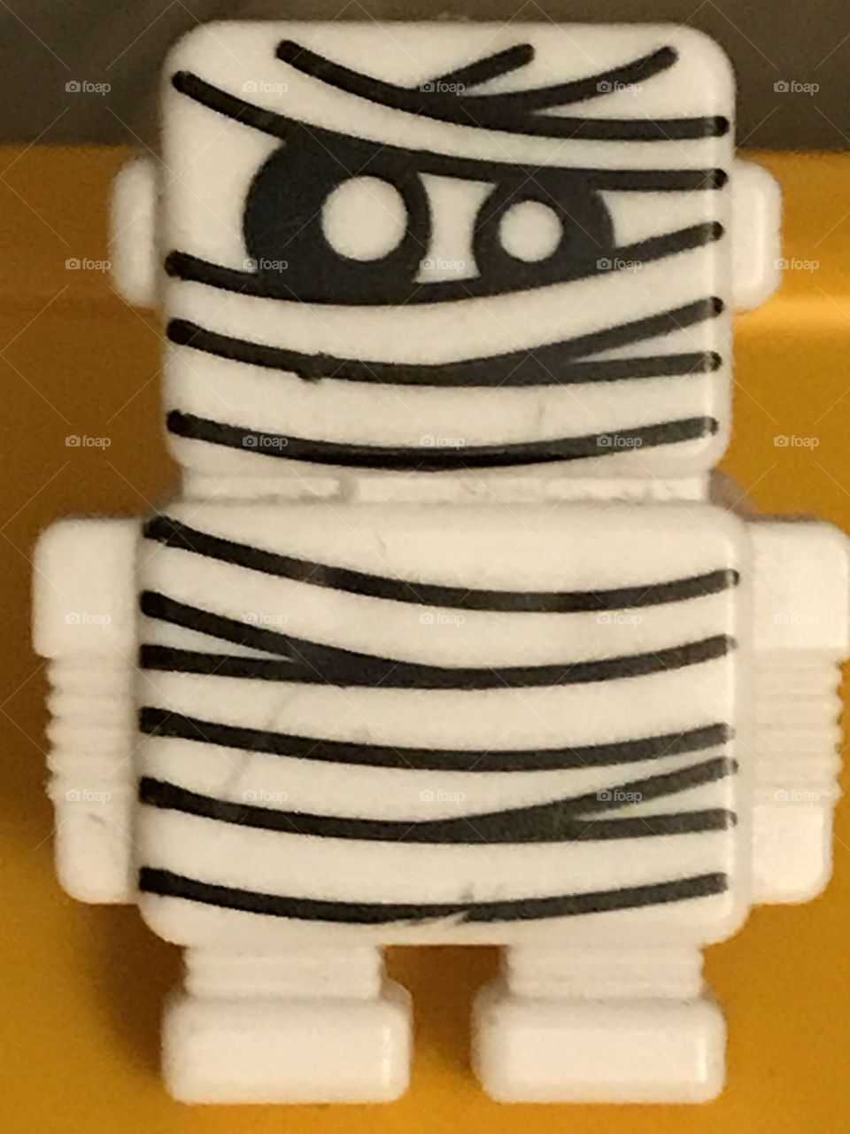A mini Egyptian mummy. He is a funny, cute sight for sore eyes.