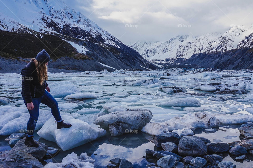 Ice from the Hooker Glacier nearly covers its lake, Mount Cook National Park, NZ