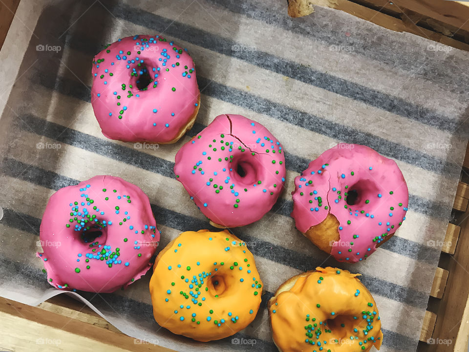 Yellow and pink donuts 