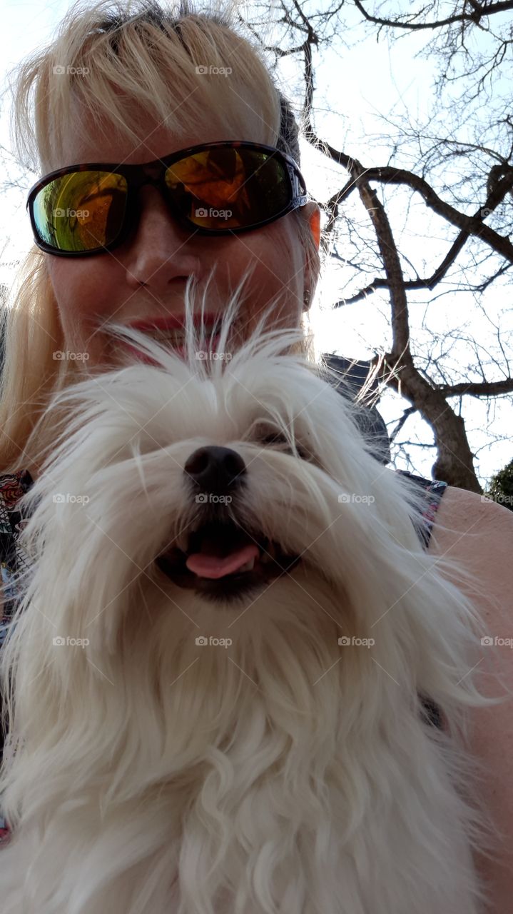 My tiny Maltese makes me so happy! Here we are taking a selfie while at the park.