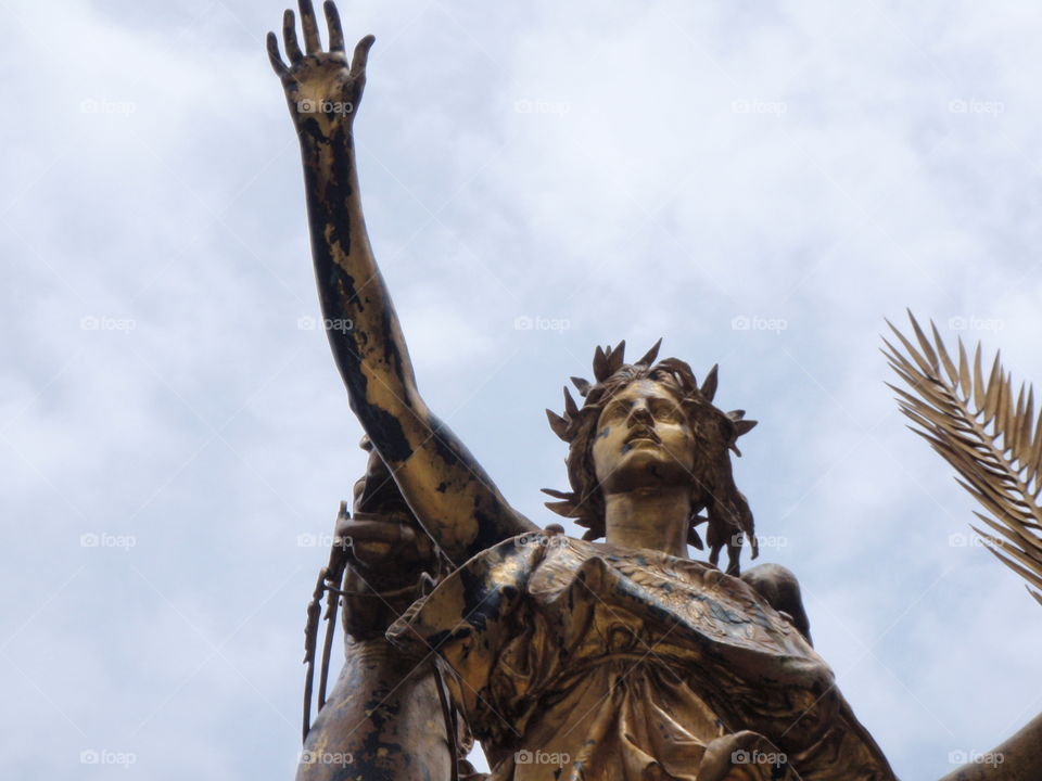 Bronze guardian. Sculpture of bronze guardian woman in Army Plaza NYC