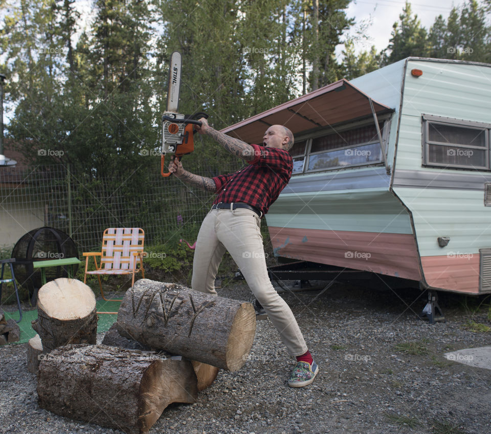 Hipster with a Chainsaw