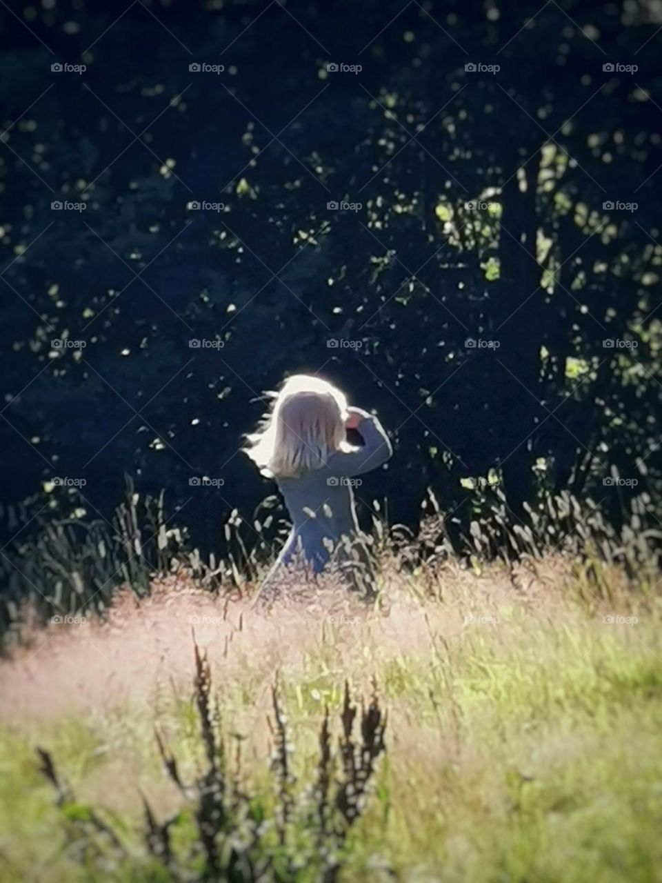 Little girl on the meadow