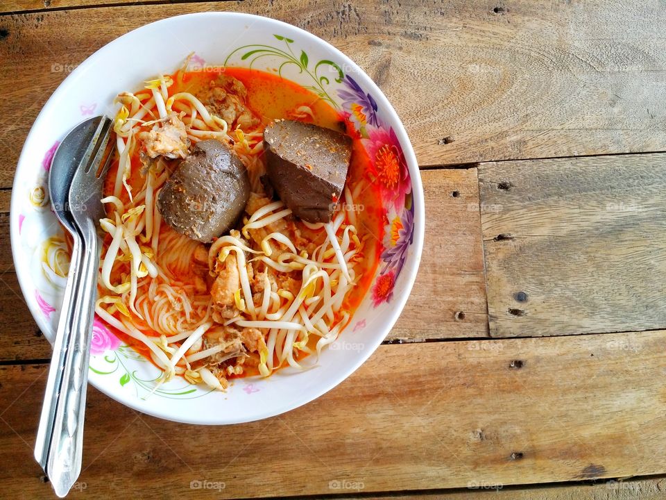 food is delicious, spicy chicken noodles Thailand.