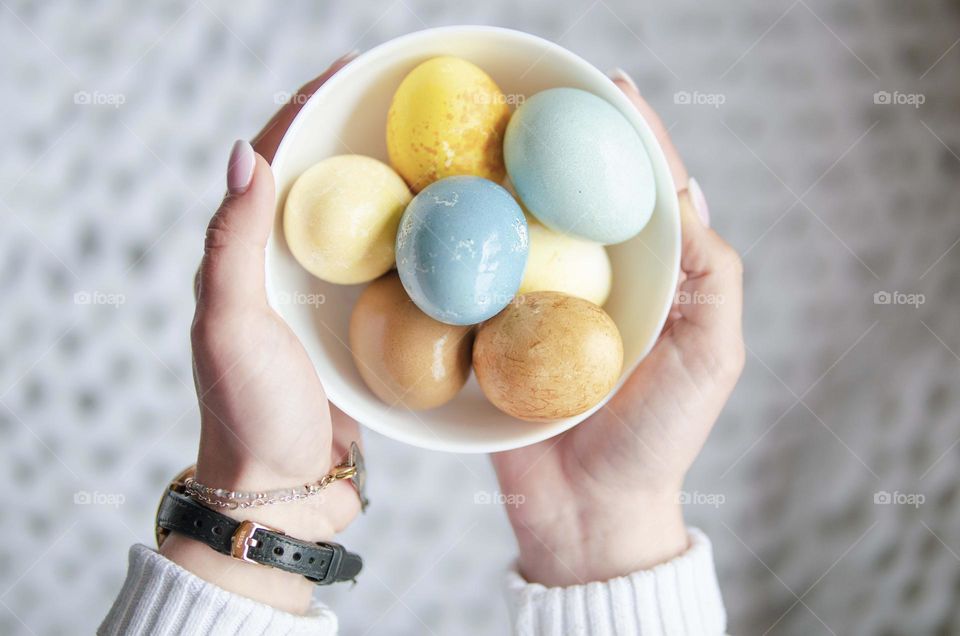 Eggs dyed with natural materials like turmeric and red cabbage