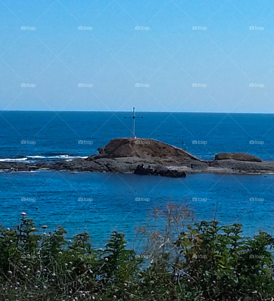 Sea with a cross