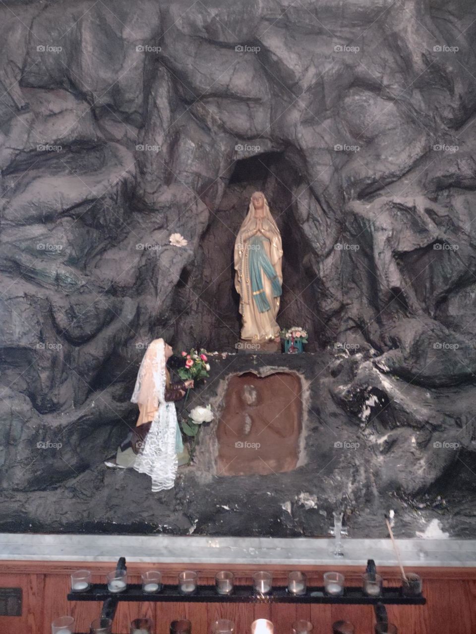 Grotto shrine to St. Bernadette and Lourdes. This apparition inspired the Miraculous Medal.