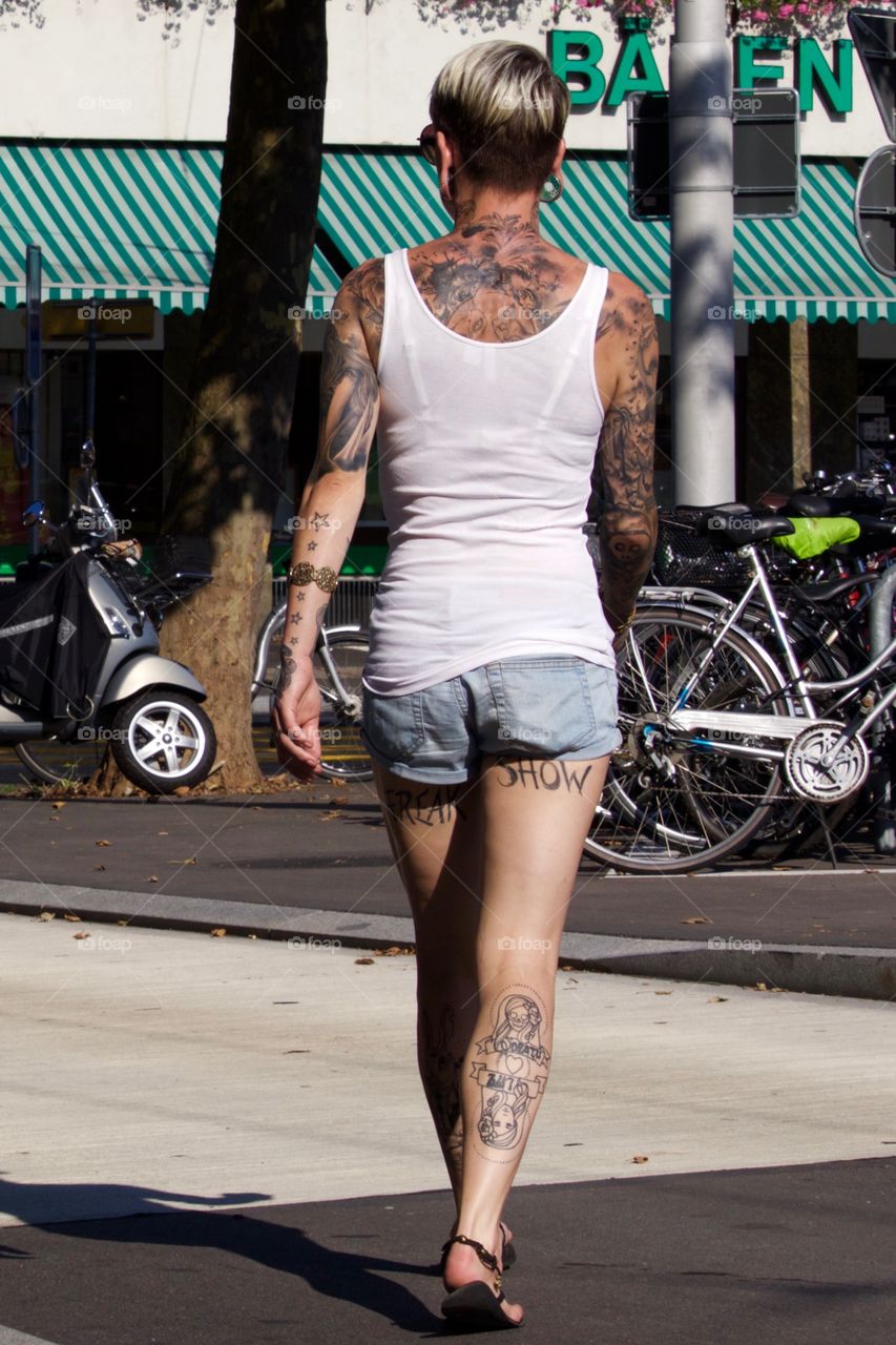 Tattooed Girl Crossing The Street