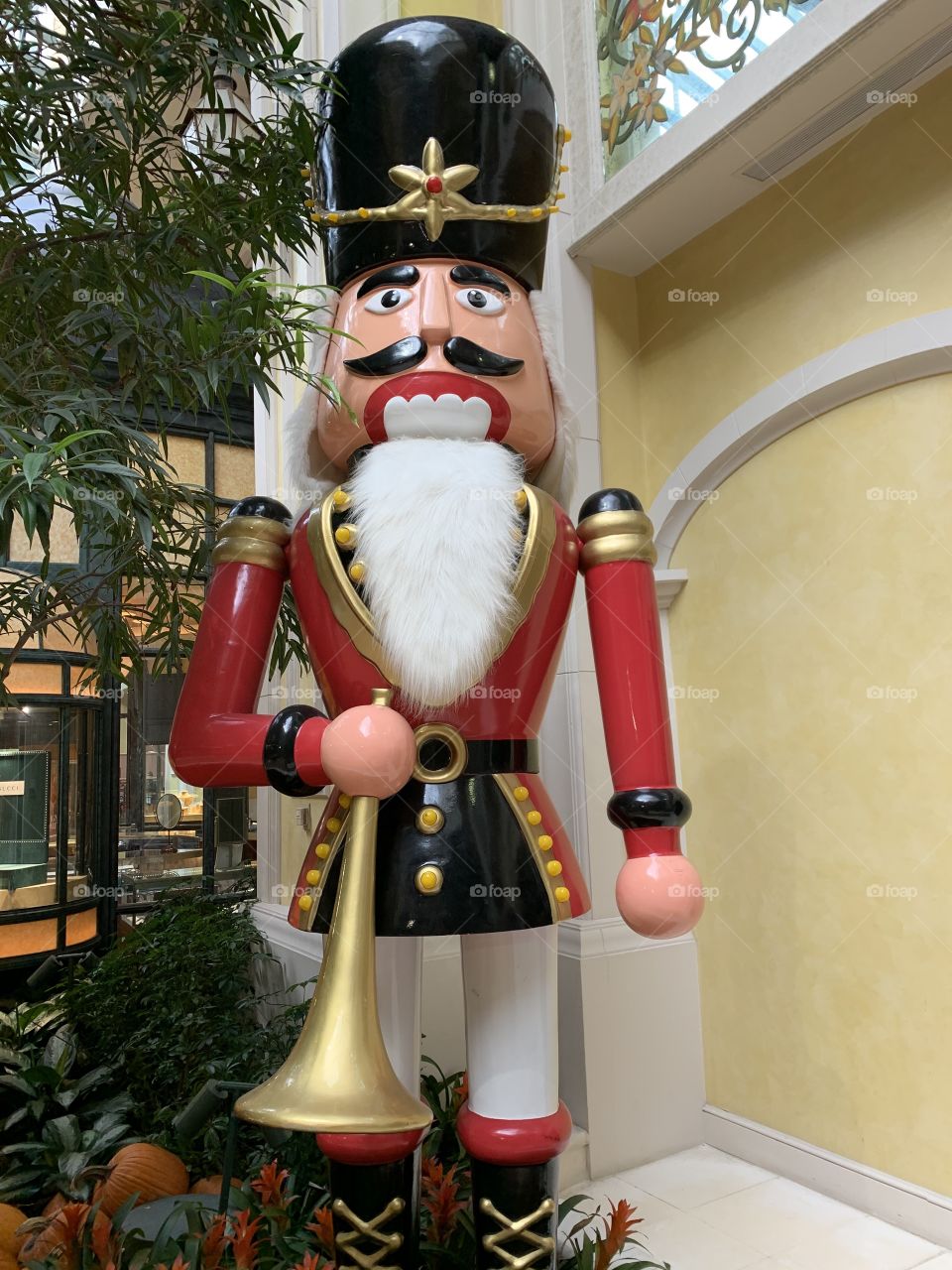 Decorating for Christmas. Large colorful decorations. The traditional colors of Christmas are pine green (evergreen), snow white, and heart red. Blue and white are often used to represent winter