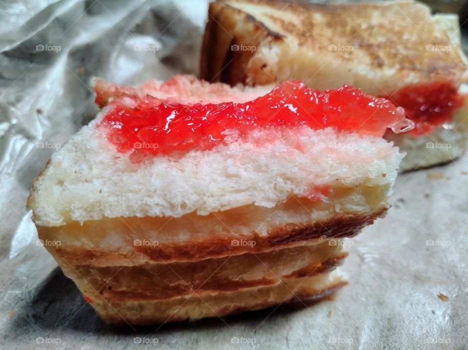 Strawberry flavored jam with toast in the wrapper