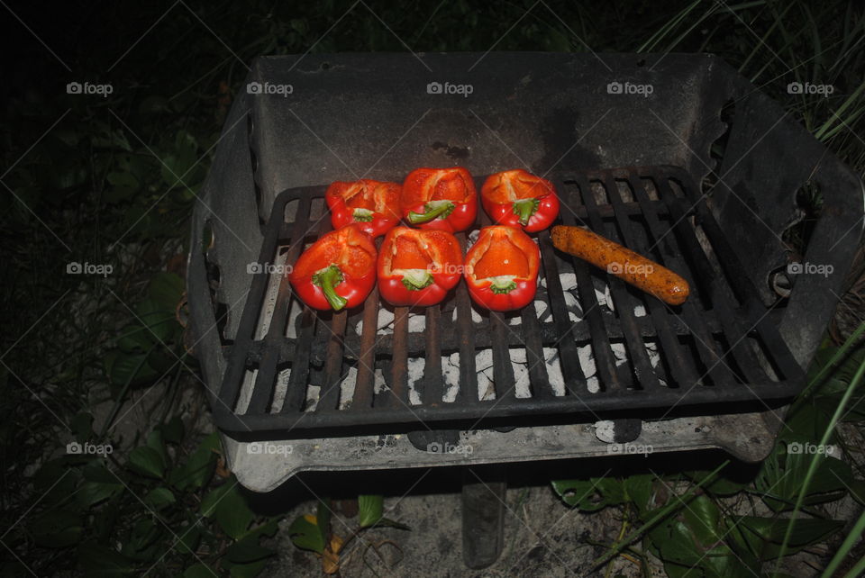 Red peppers and sausage on the grill