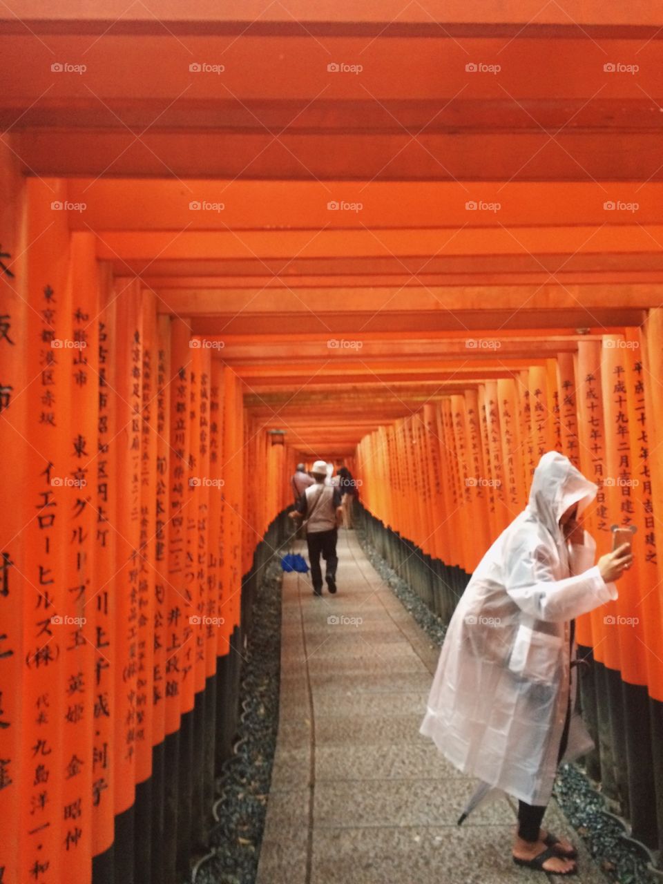 Tourists at Fushimi Inari Shrine in Rain (public area)