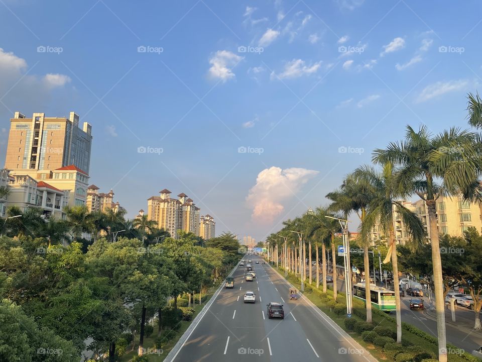 City traffic under blue sky