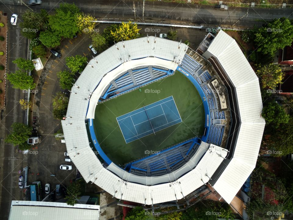 high angle view above tennis courts from drone