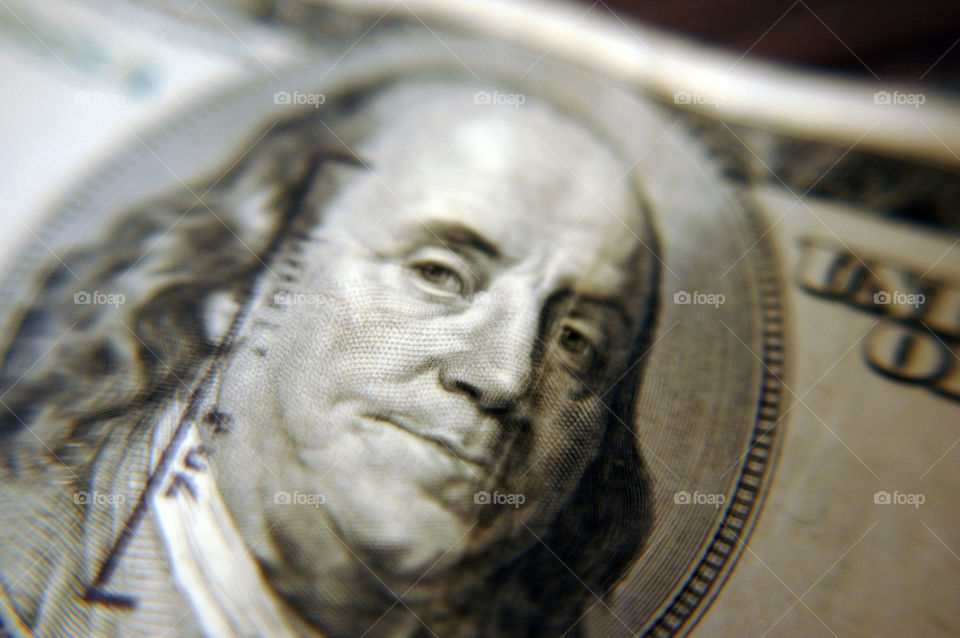 close up on a hundred dollar bill