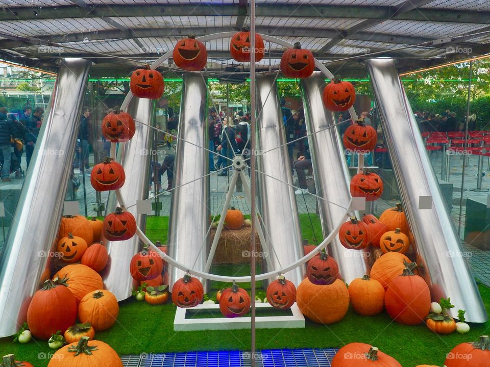 Pumpkins in miniature model of London eye for Halloween.