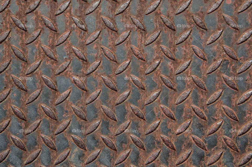 Rusted metal tread plate background 