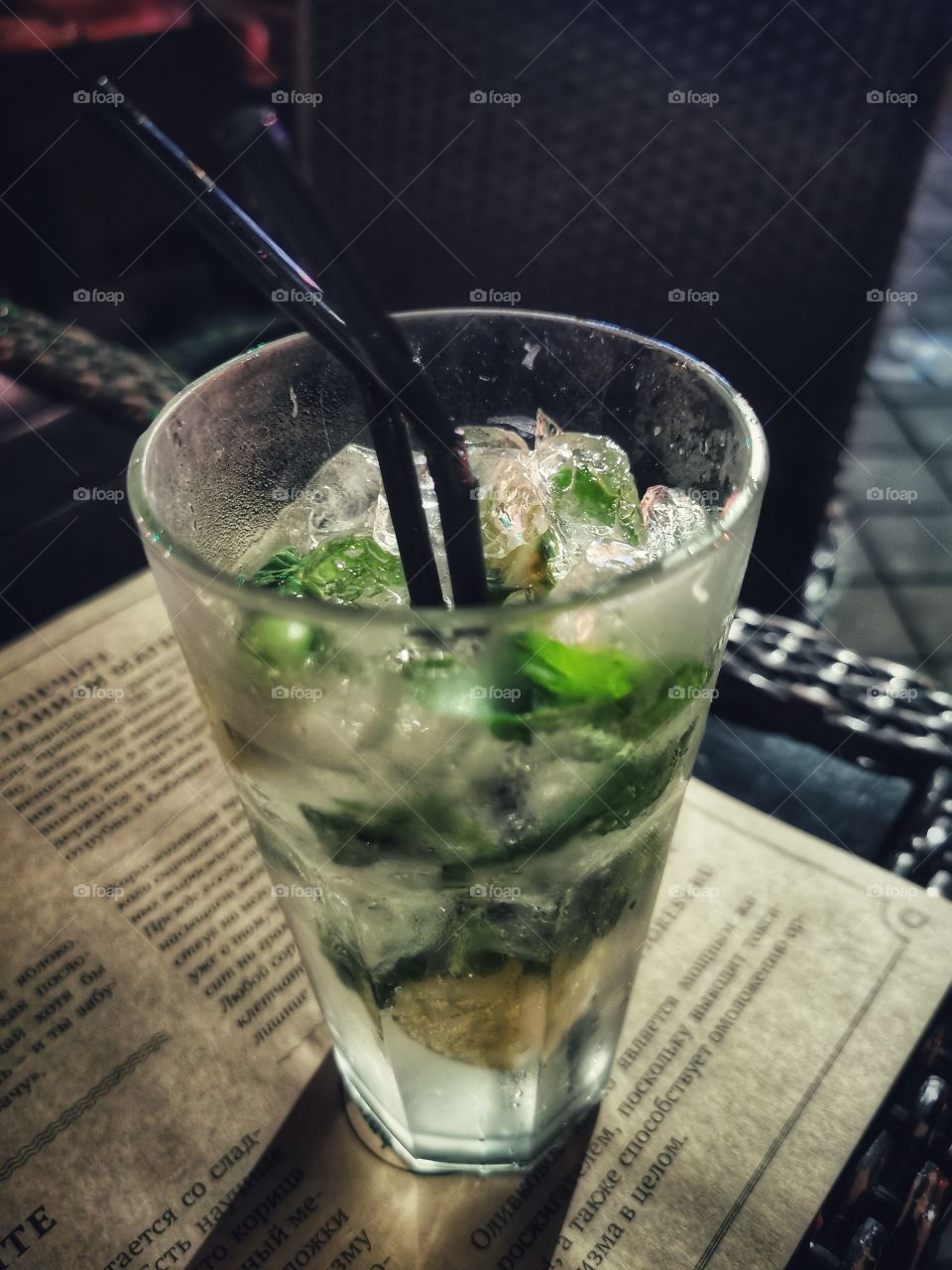 Sweet Cafe restaurant indoor drink yummy served table night part green mint mohito non-alco form circle ellipce tasty tasty table served view outside joy happy